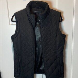 Andrew Marc, black quilted full zip vest size small, like new condition.